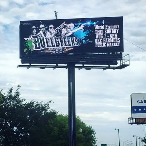 A billboard promotes the world premiere of The Bulleteers in 2016.